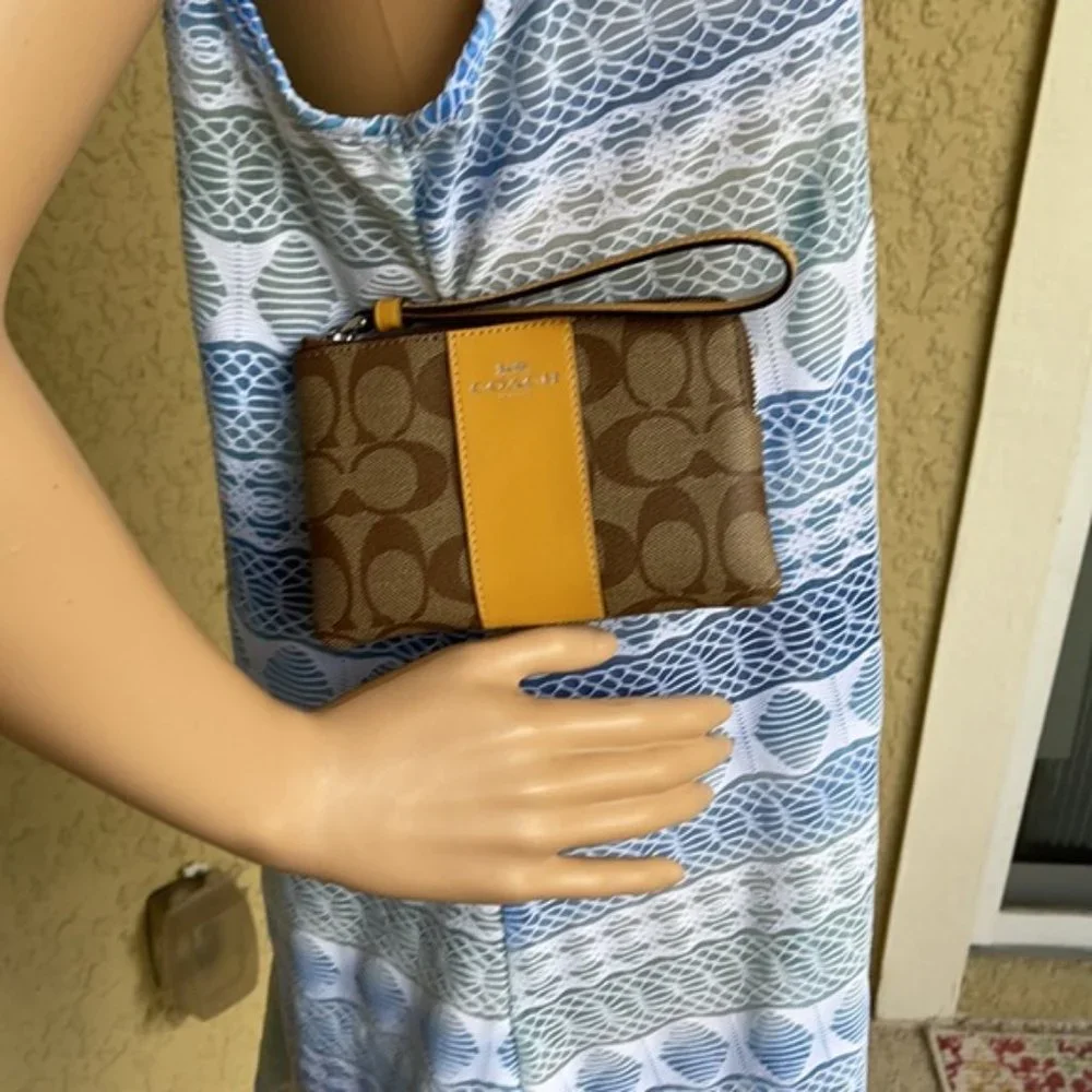 COACH Signature PVC Leather Corner Zip Wristlet